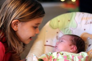 Ashley's daughter with baby sis