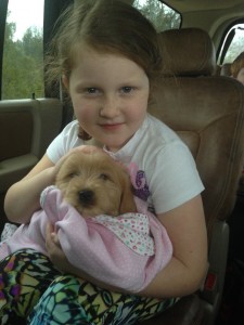 girl and puppy